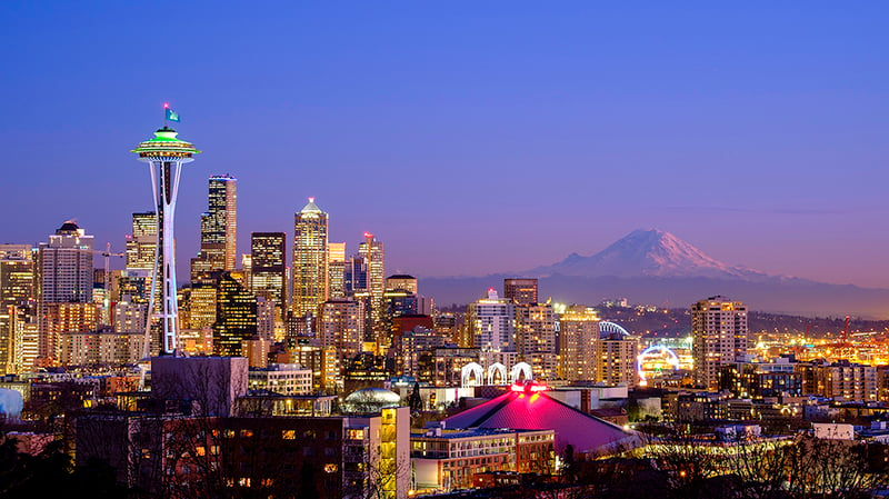 Seattle-skyline-at-night-with-Mt-Rainier-in-the-distance-Web
